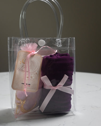 hijab gift set with crochet heart keychain and purple hijab in a bag
