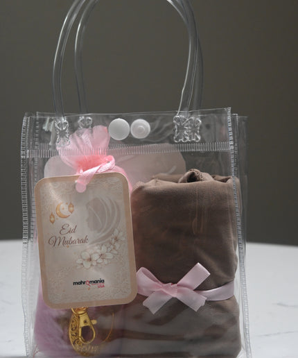 hijab gift set with crochet heart keychain and light brown hijab in a bag
